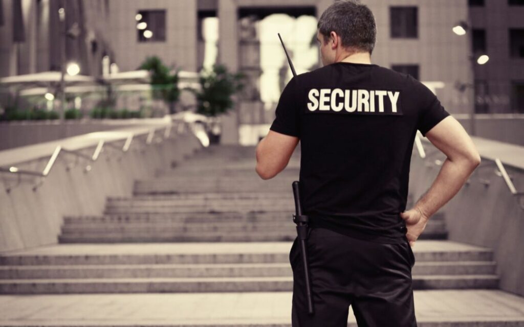 Security Guard on Phone